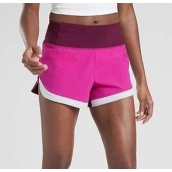 62 NWOT ATHLETA RUNNING FREE LINED hot pink color block SPORT gym SHORTS - Picture 1 of 1